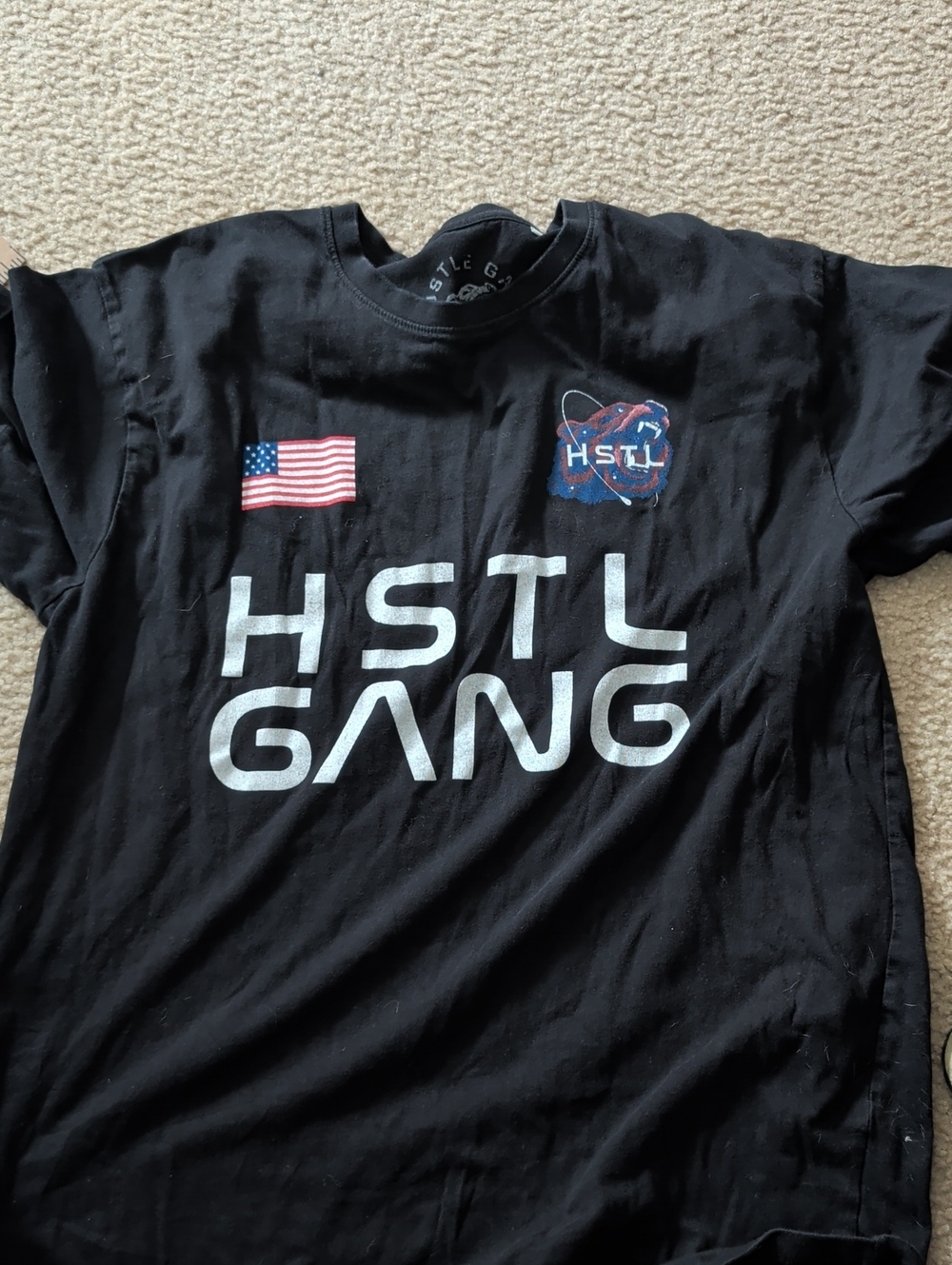 Hustle Gang Black Tee with White Logo and Red/Blue Accents